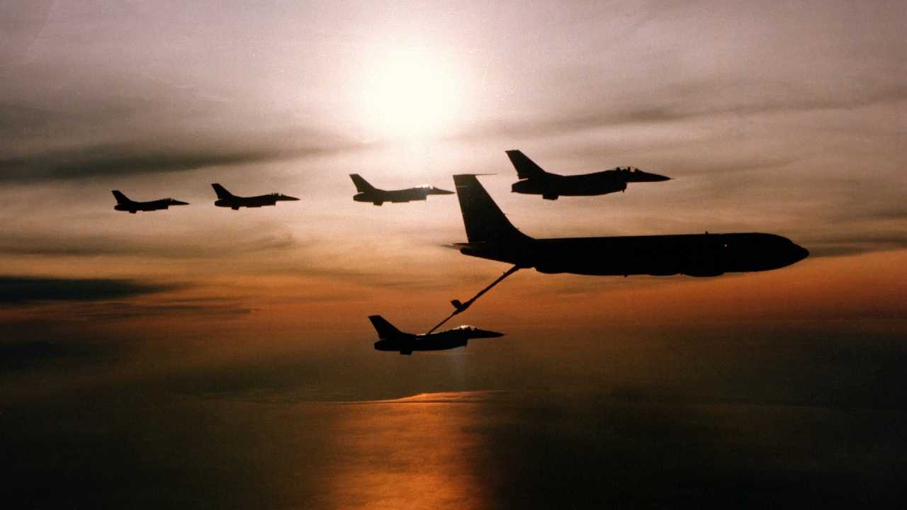 Tanker plane refueling a jet below